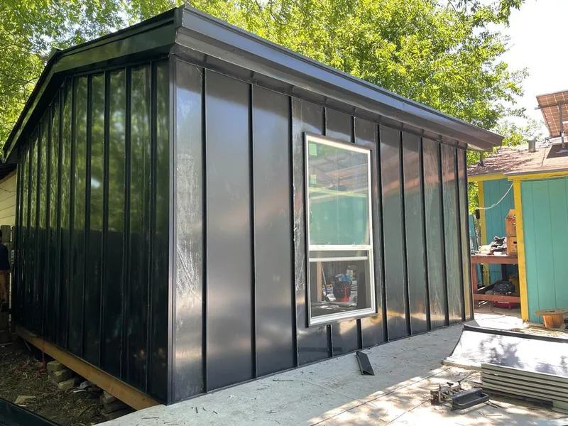 Black standing seam metal wall panels for Roof Inspection in Woodridge