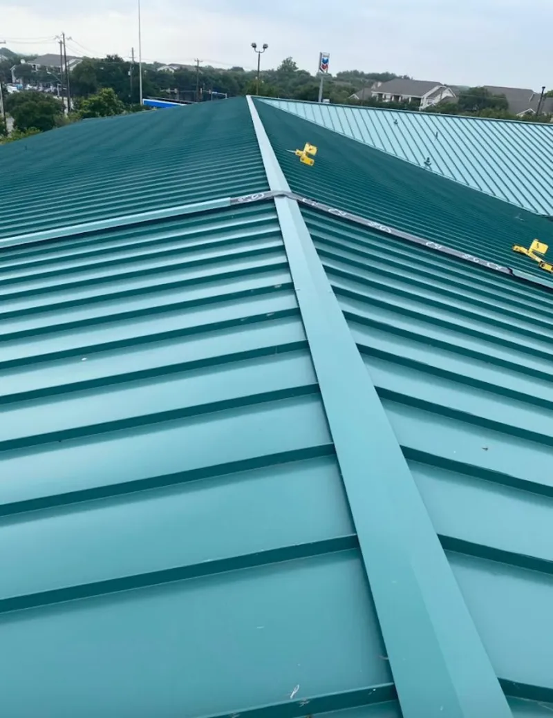 Green commercial metal roof ridge and valley for Metal Roof Repair in Woodridge