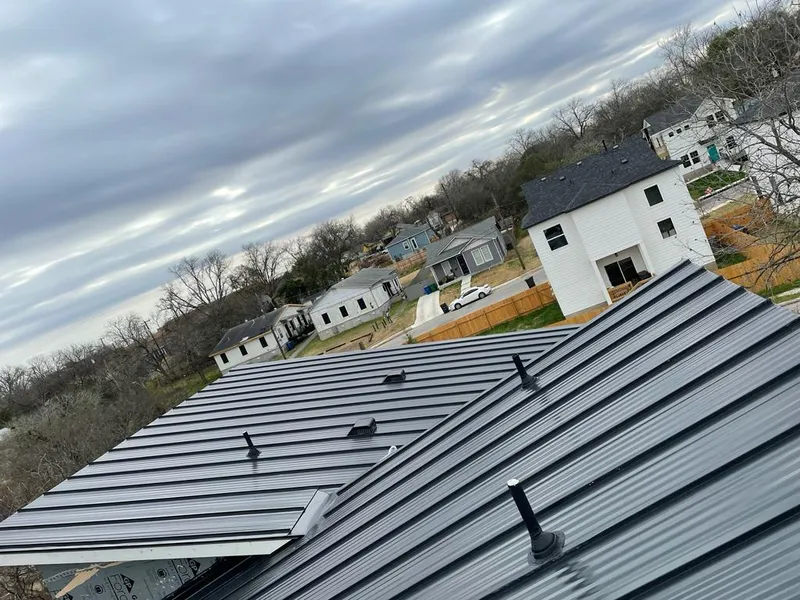 Standing seam metal roof panels with vents for Skylight Repair in Woodridge